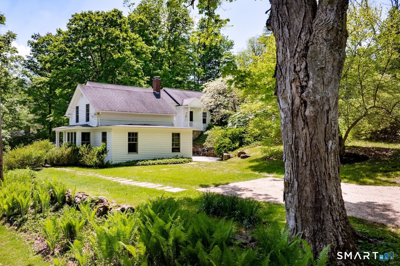 329 Housatonic River Road Salisbury, CT 06031 - Photo 14 of 32 a view of a house with pool and tree s