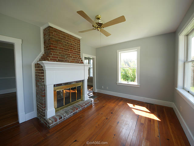 142 Folly Rd Boulevard Charleston, SC 29407 - Photo 13 of 52 Double Sided Fireplace in the Sunroom