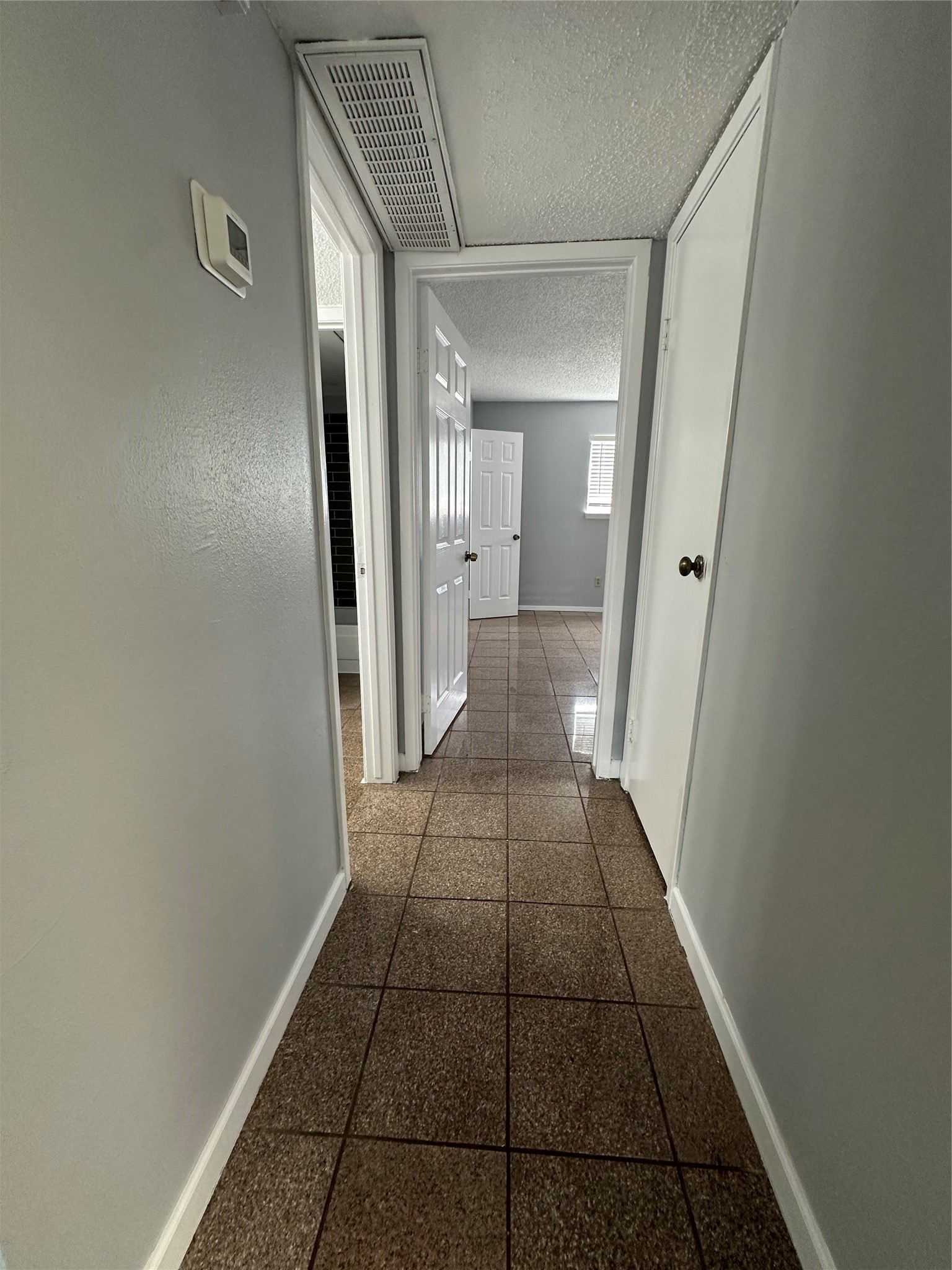 6701 Sands Point Drive, Unit 66 Houston, TX 77074 - Photo 13 of 19 a view of a hallway