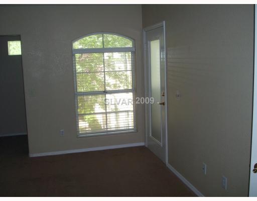 7400 West Flamingo Road, Unit 2054 Las Vegas, NV 89147 - Photo 4 of 4 Master Bedroom. Double door entry to master bedroom, separate exit to balcony