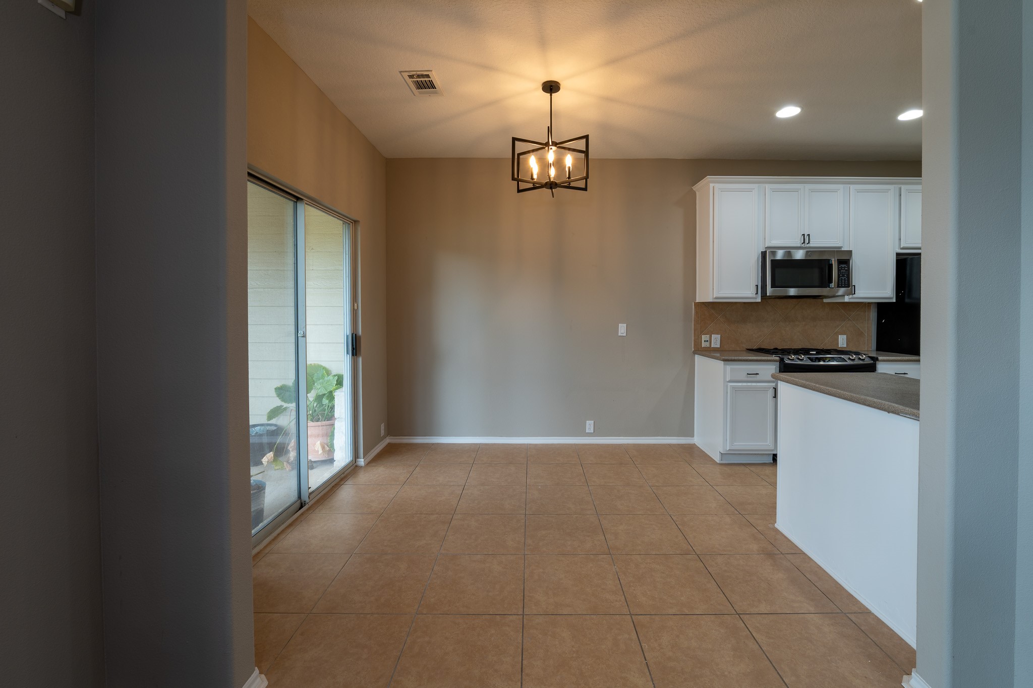 13600 Breton Ridge Street, Unit 35C Houston, TX 77070 - Photo 13 of 35 a view of a kitchen with a sink and a window