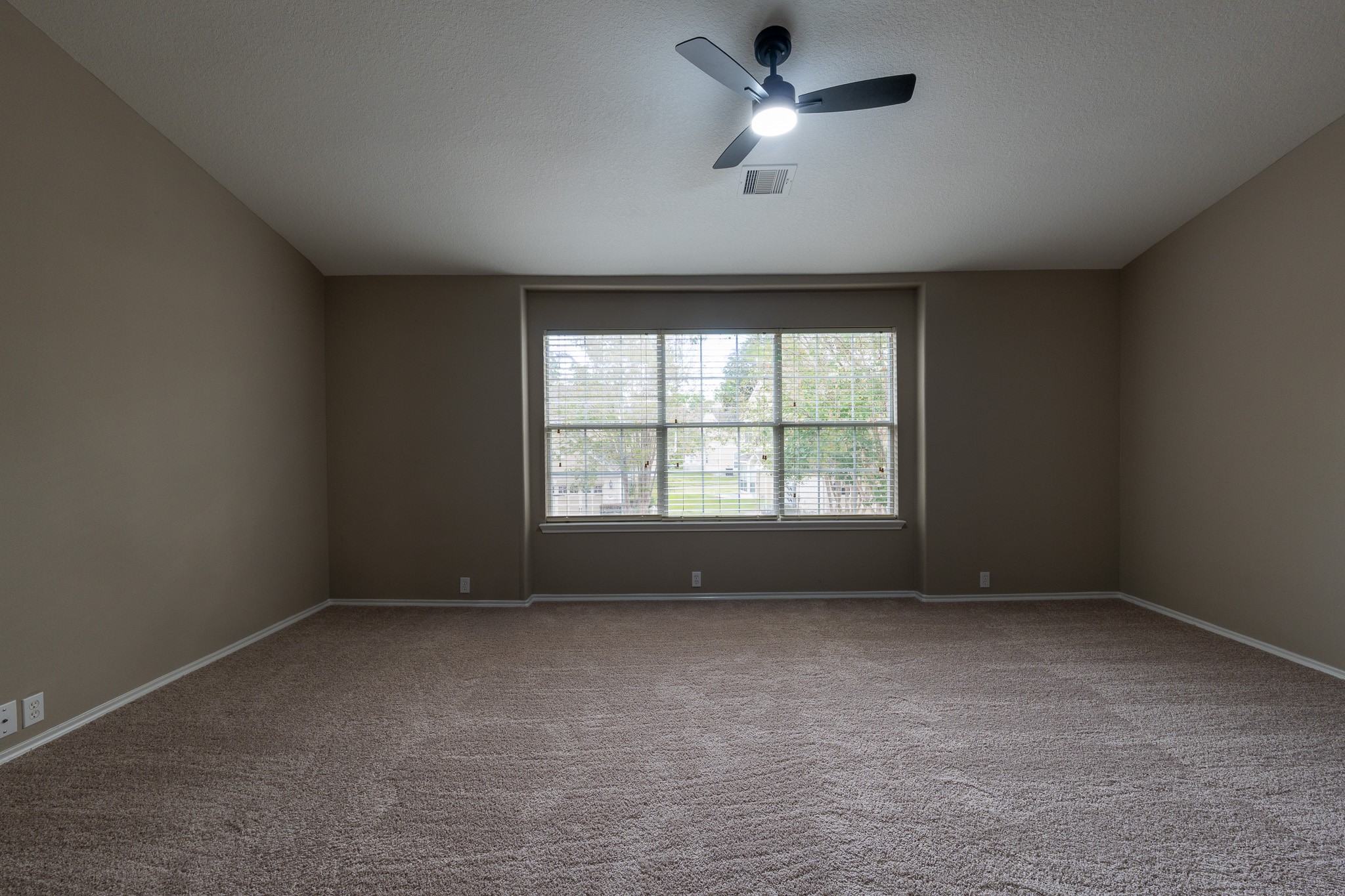 13600 Breton Ridge Street, Unit 35C Houston, TX 77070 - Photo 16 of 35 an empty room with a window