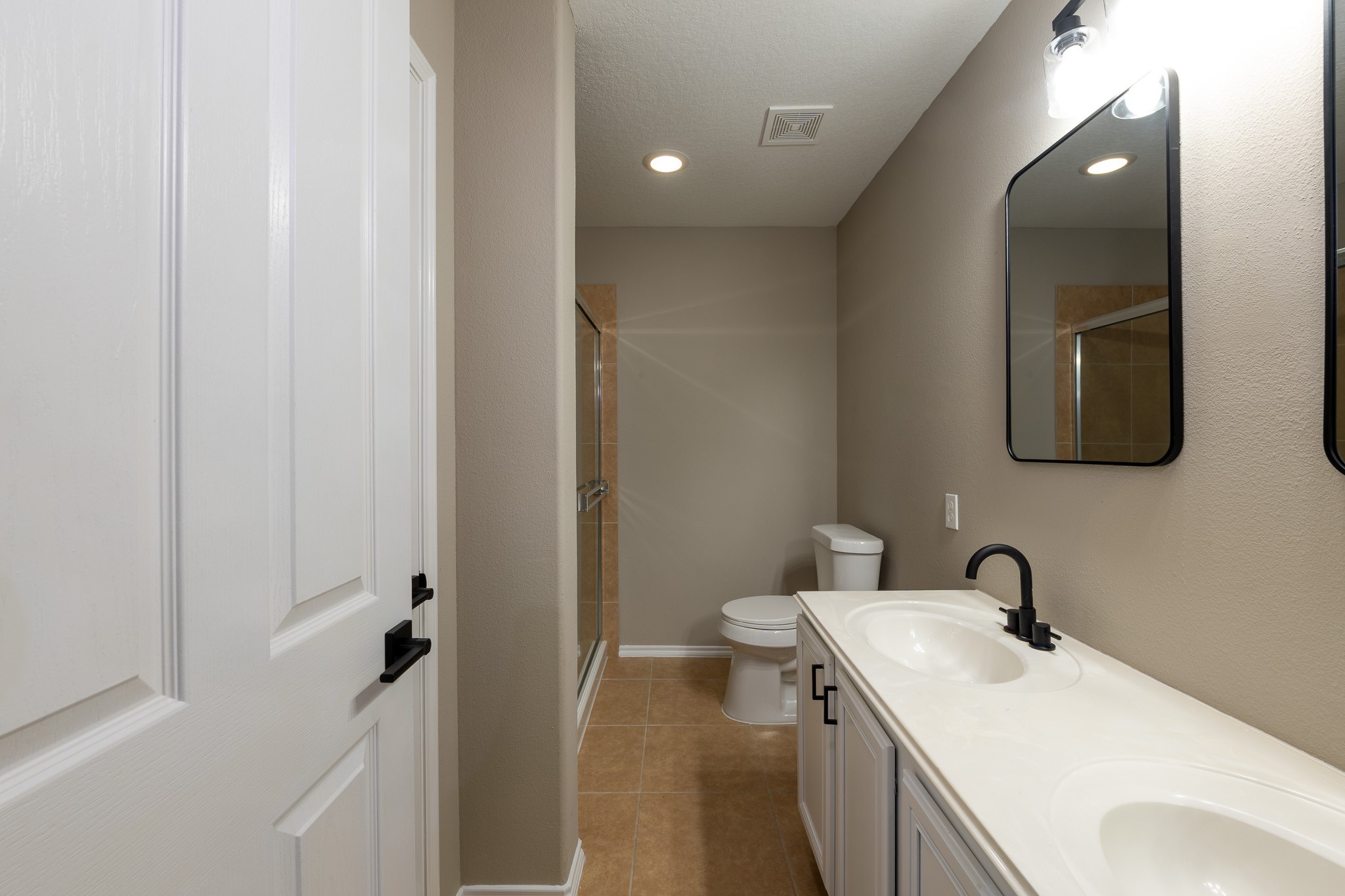 13600 Breton Ridge Street, Unit 35C Houston, TX 77070 - Photo 20 of 35 a bathroom with a sink toilet and vanity