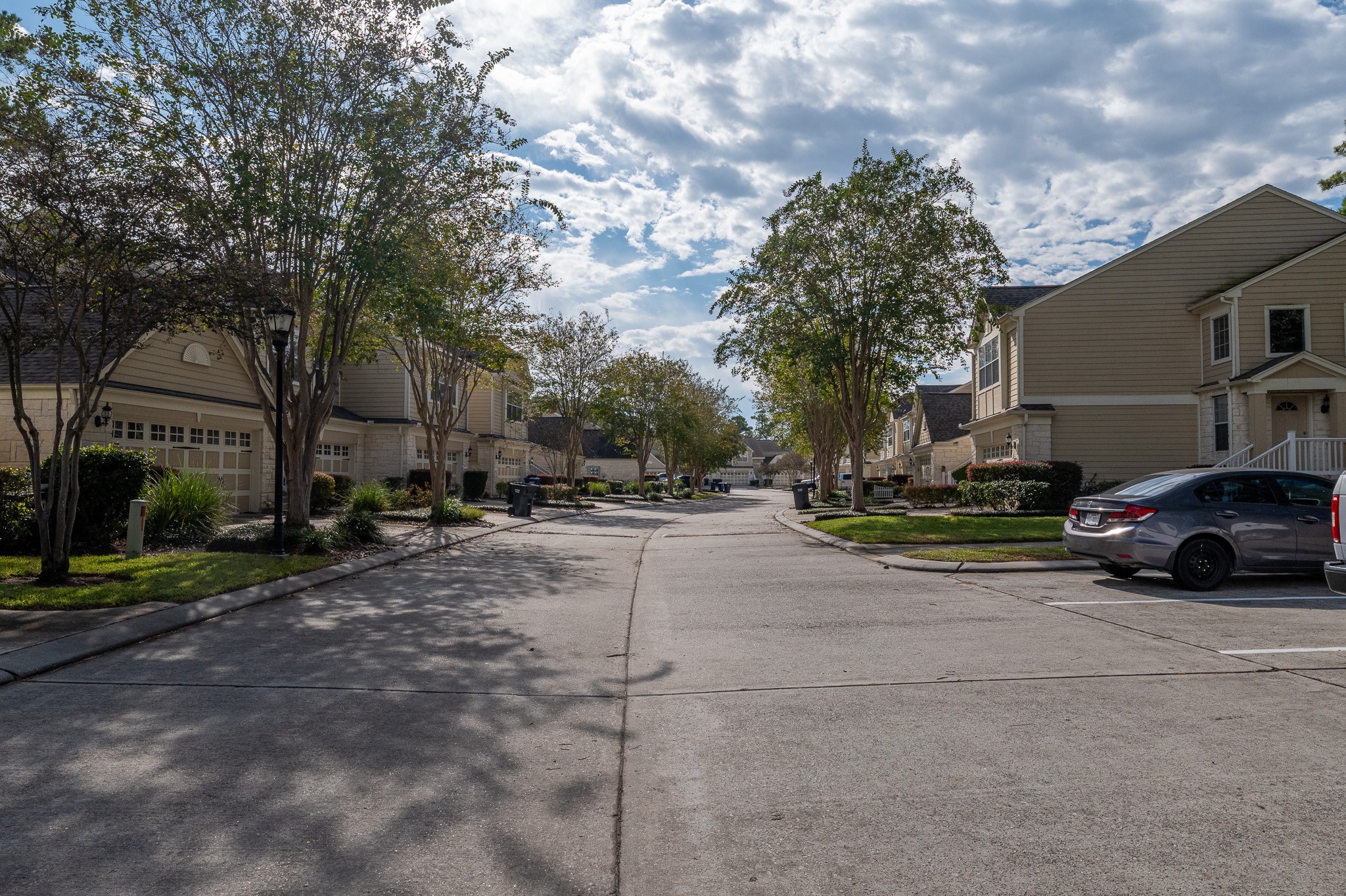 13600 Breton Ridge Street, Unit 35C Houston, TX 77070 - Photo 34 of 35 a car parked on the side of the road