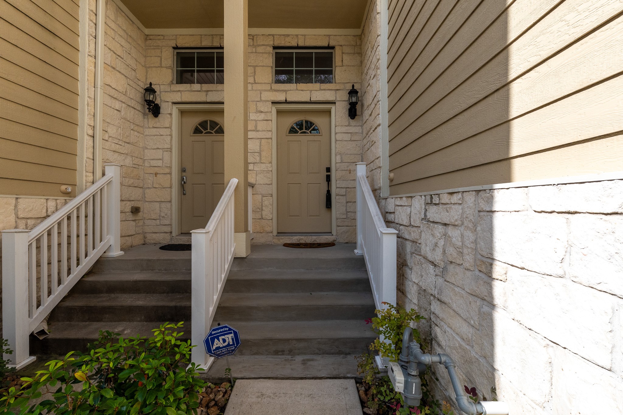 13600 Breton Ridge Street, Unit 35C Houston, TX 77070 - Photo 4 of 35 a view of a pathway of a house with wooden floor and plants