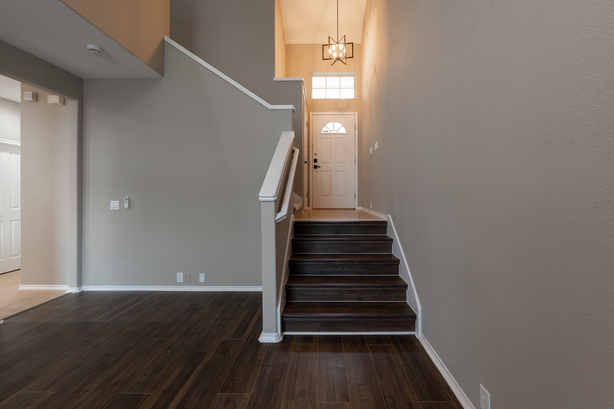 13600 Breton Ridge Street, Unit 35C Houston, TX 77070 - Photo 6 of 35 a view of entryway and hall with wooden floor