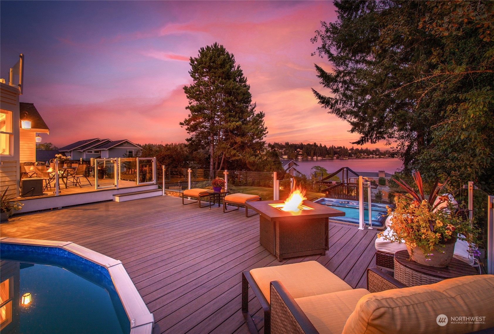 1726 Vernon Road Lake Stevens, WA 98258 - Photo 6 of 40 a view of a patio with couches chairs under an umbrella