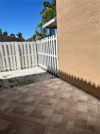 a view of a backyard with a garden