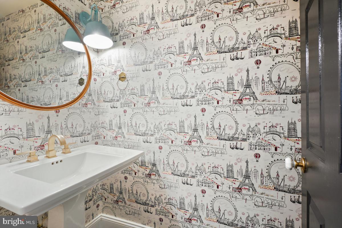 417 Emerson Street Northwest Washington, DC 20011 - Photo 12 of 47 a bathroom with a sink and a mirror