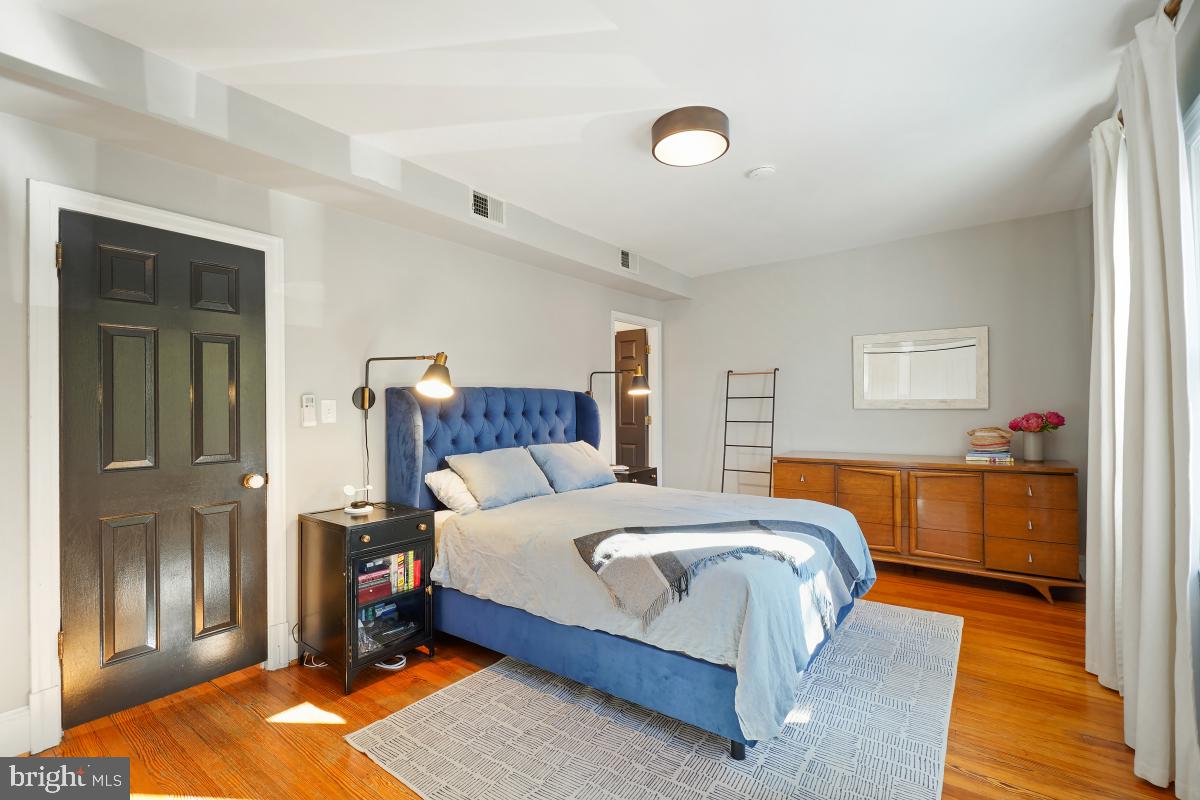 417 Emerson Street Northwest Washington, DC 20011 - Photo 32 of 47 a bedroom with a bed and a closet