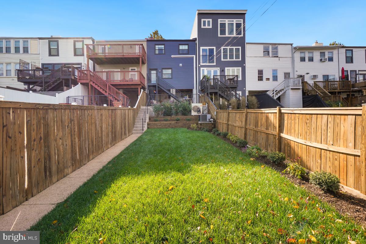 417 Emerson Street Northwest Washington, DC 20011 - Photo 44 of 47 a view of a house with backyard and sitting area