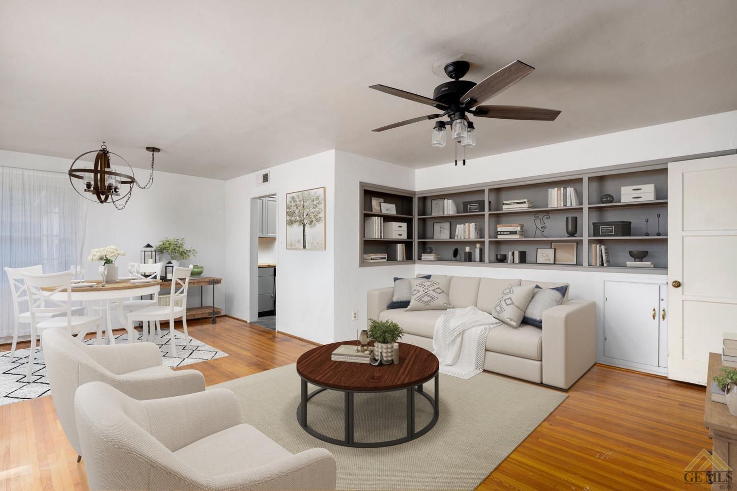 Undisclosed Address Bakersfield, CA 93301 - Photo 4 of 21 a living room with furniture