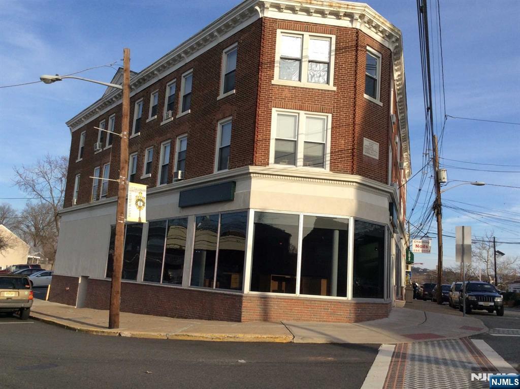 a view of a building with a street