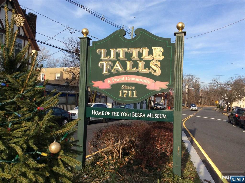 70 Main Street, Unit 4 Little Falls, NJ 07424 - Photo 2 of 2 a sign on the side of a street