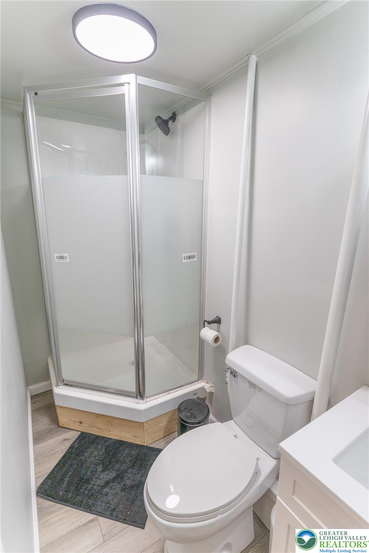 896 Briarstone Road Bethlehem, PA 18017 - Photo 21 of 26 a white toilet sitting next to a tub