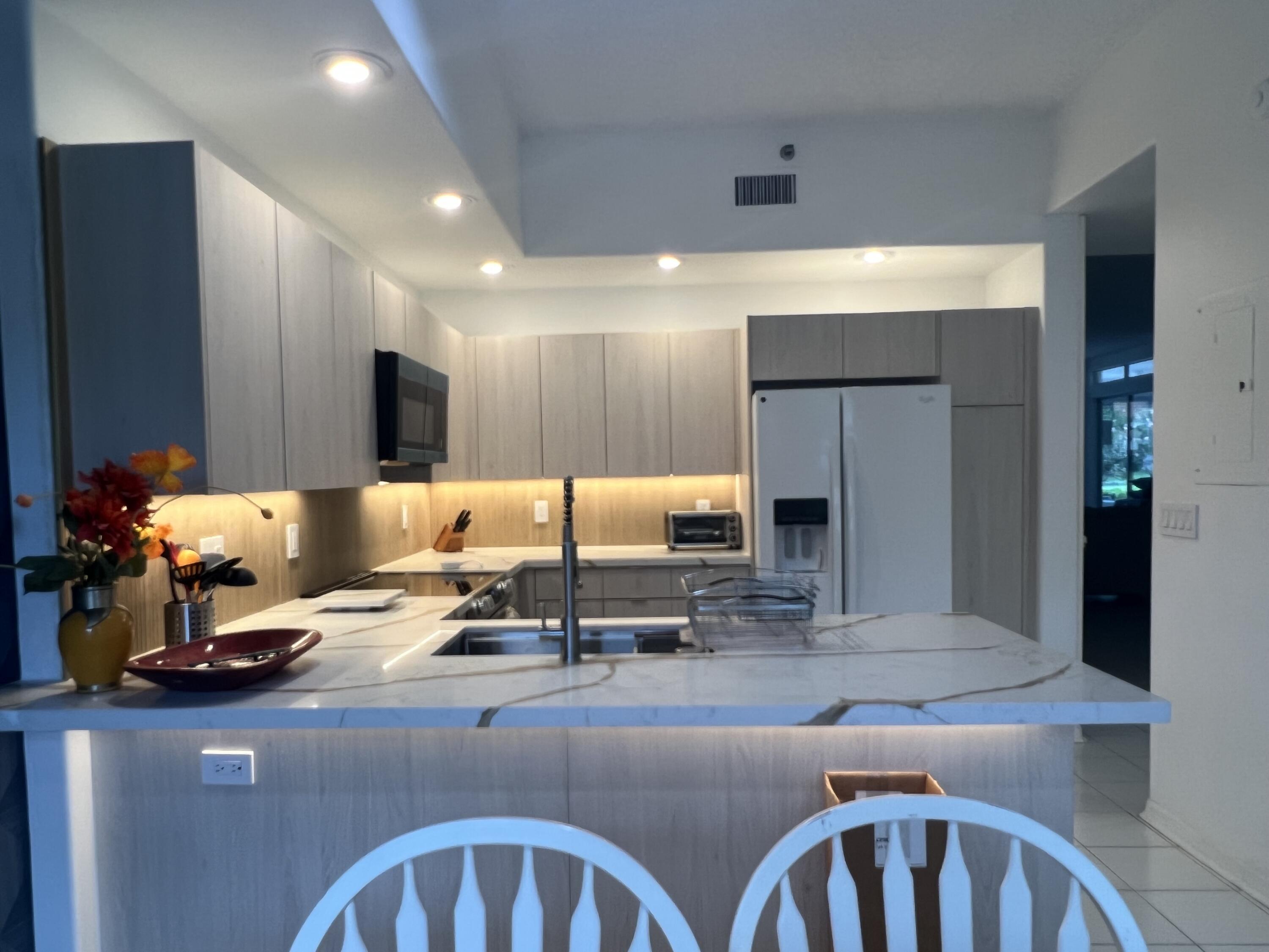2431 Northwest 59th Street, Unit 404 Boca Raton, FL 33496 - Photo 9 of 27 IMG_4394