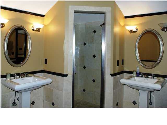 54 Atticus Road Rosemary Beach, FL 32461 - Photo 14 of 19 a bathroom with a sink mirror and a toilet