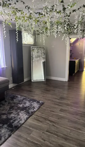 a bathroom with a sink and a potted plant
