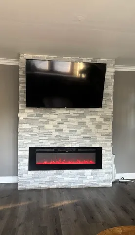 a kitchen with stainless steel appliances granite countertop a stove a sink and a granite counter tops