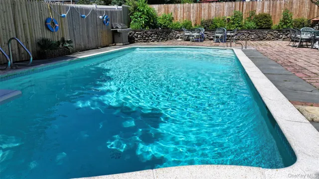 a view of house with outdoor seating space