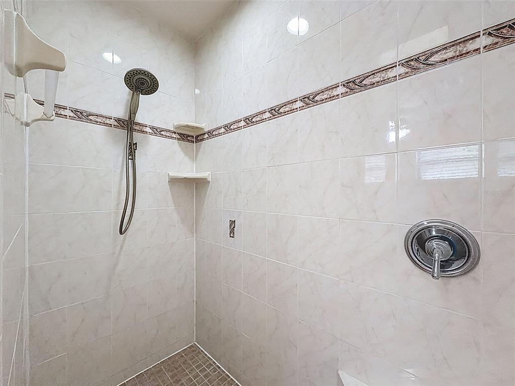 4289 Castle Avenue Spring Hill, FL 34609 - Photo 19 of 50 a bathroom with a shower and a sink