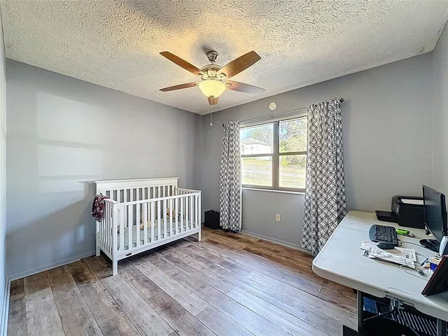 a workspace with furniture and window