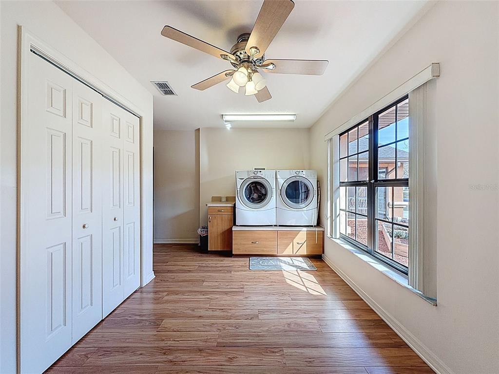 4289 Castle Avenue Spring Hill, FL 34609 - Photo 38 of 50 a view of an entryway with wooden floor