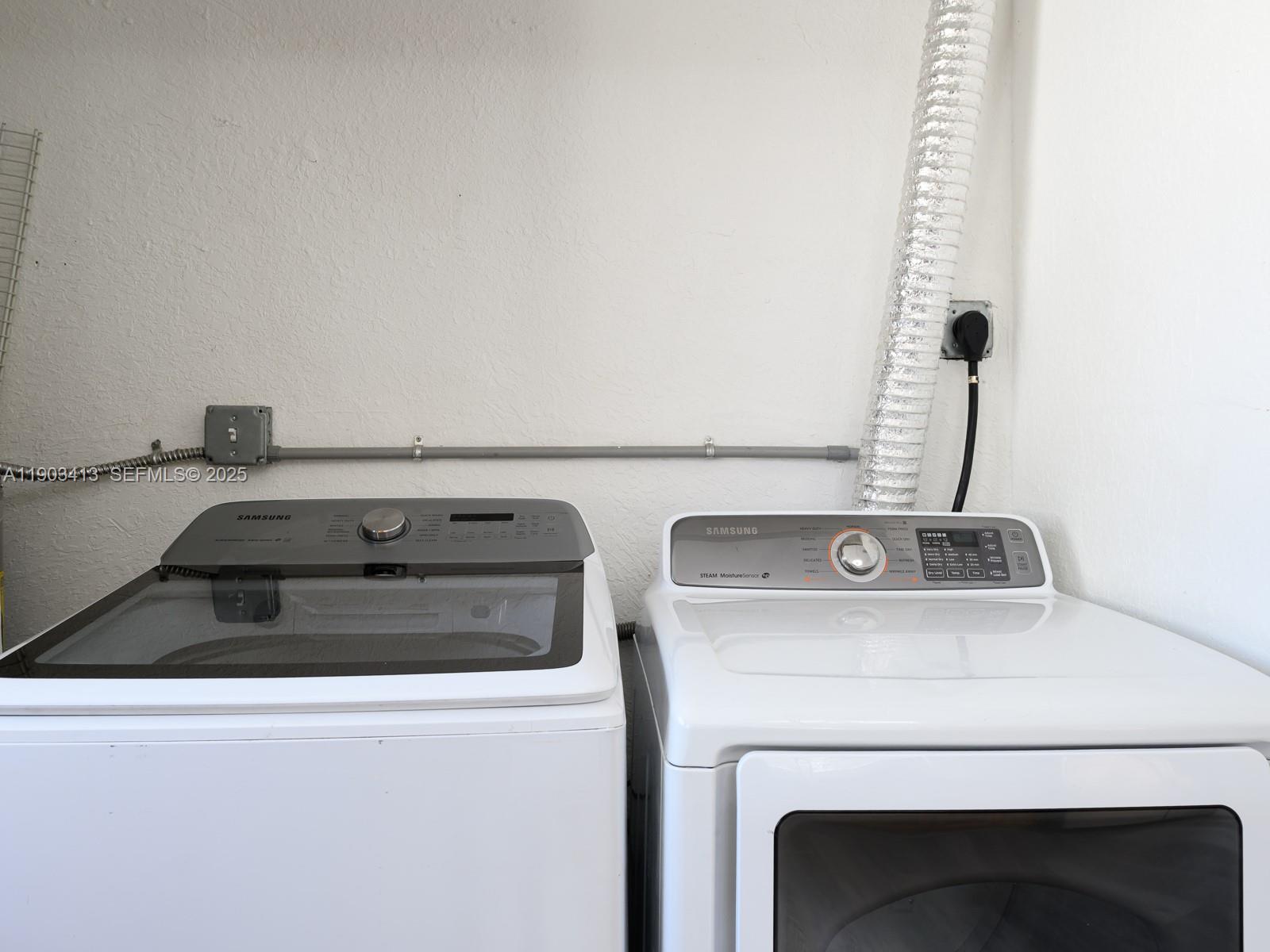 6238 Southwest 24th Street Miramar, FL 33023 - Photo 20 of 33 a close view of washer and dryer
