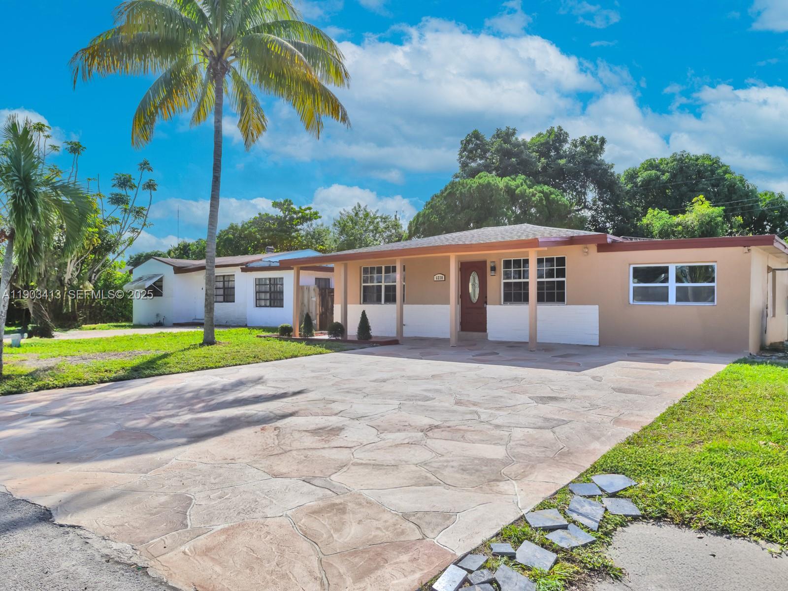 6238 Southwest 24th Street Miramar, FL 33023 - Photo 2 of 33 a view of a house with a swimming pool