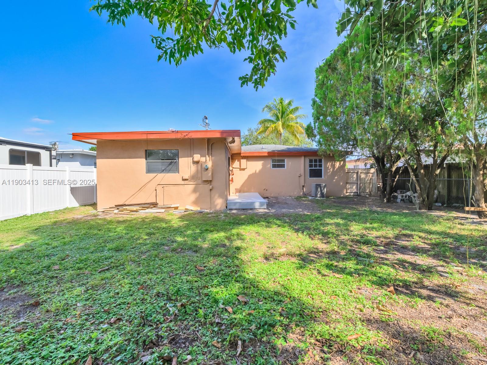 6238 Southwest 24th Street Miramar, FL 33023 - Photo 24 of 33 a front view of a house with garden