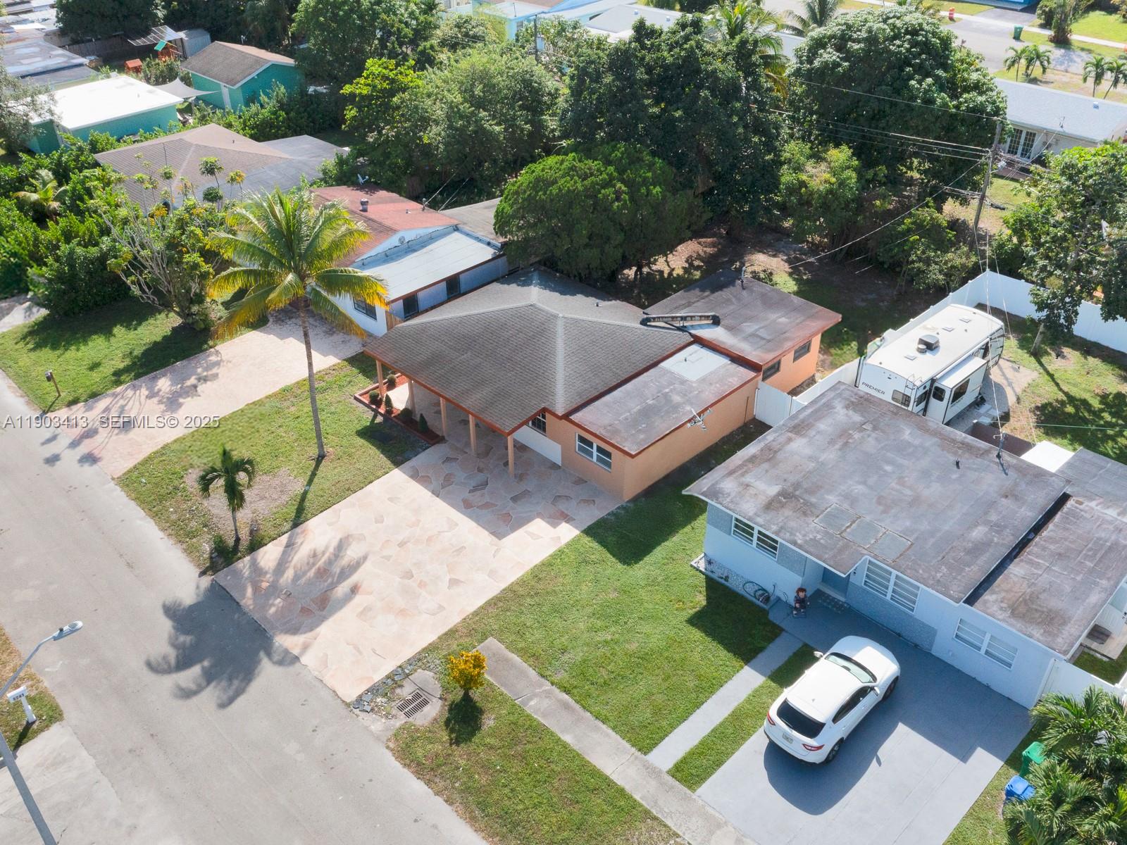 6238 Southwest 24th Street Miramar, FL 33023 - Photo 31 of 33 an aerial view of a house with garden space and street view