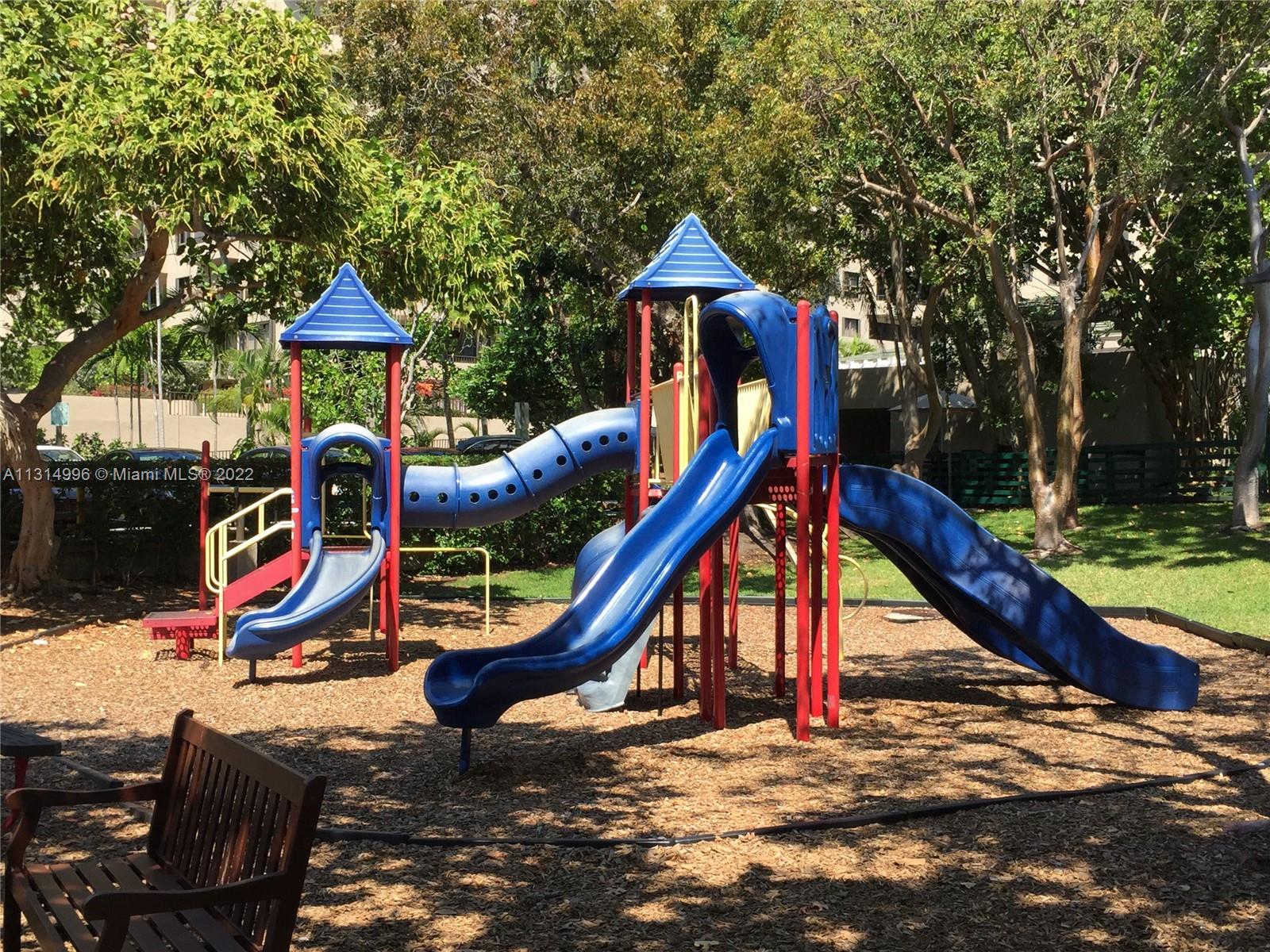 151 Crandon Boulevard, Unit 439 Key Biscayne, FL 33149 - Photo 13 of 24 a view of outdoor space with seating