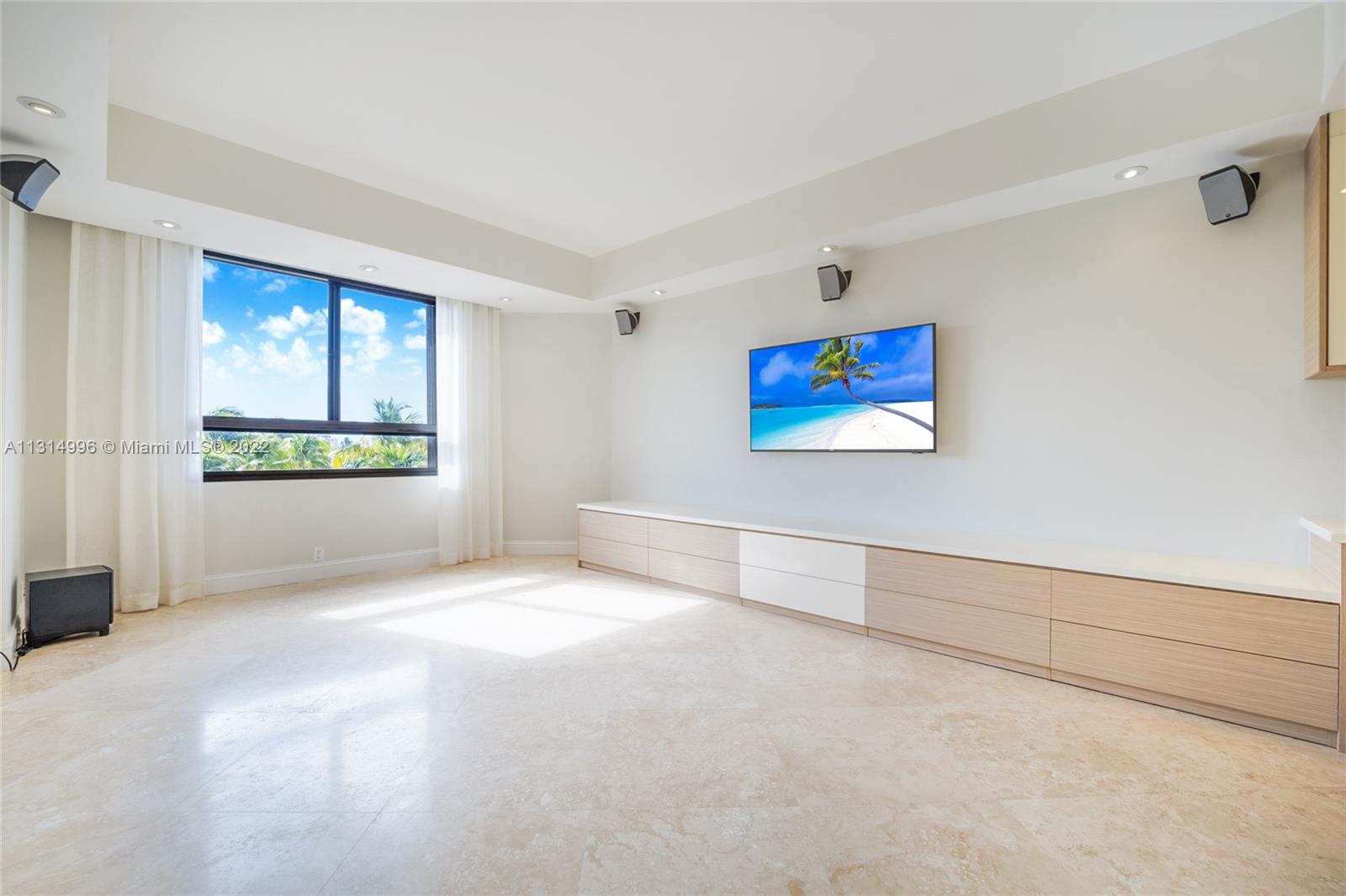 151 Crandon Boulevard, Unit 439 Key Biscayne, FL 33149 - Photo 7 of 24 a view of an empty room with a window