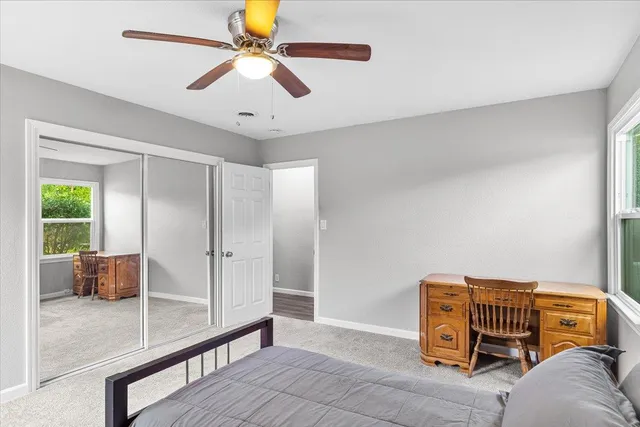 a view of a workspace with furniture