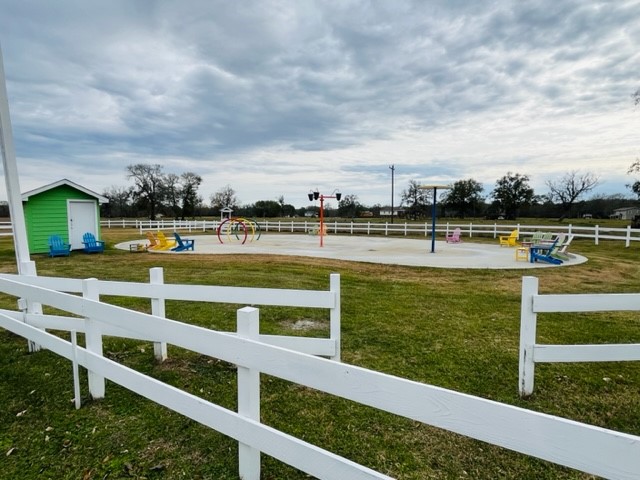 Lot 305 Trinity Drive Cleveland, TX 77327 - Photo 8 of 11 a view of a swimming pool with an ocean view