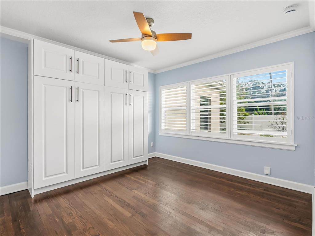 2330 Hickory Lane Orlando, FL 32803 - Photo 21 of 30 wooden floor in an empty room with a window