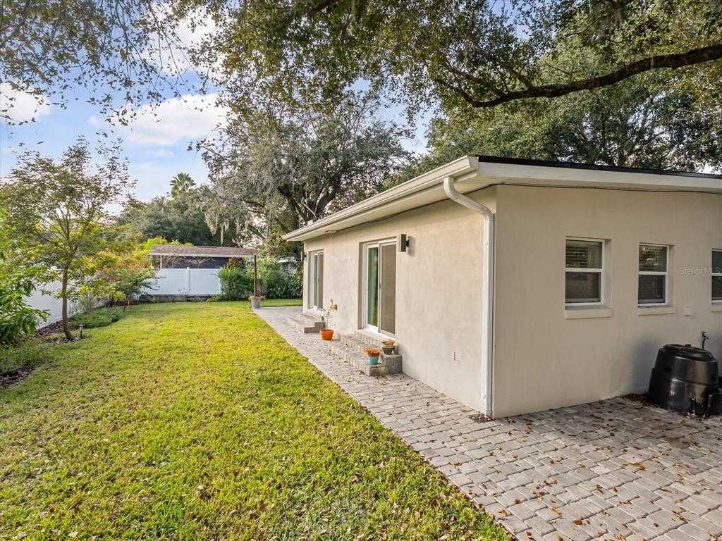 2330 Hickory Lane Orlando, FL 32803 - Photo 29 of 30 a front view of a house with a yard