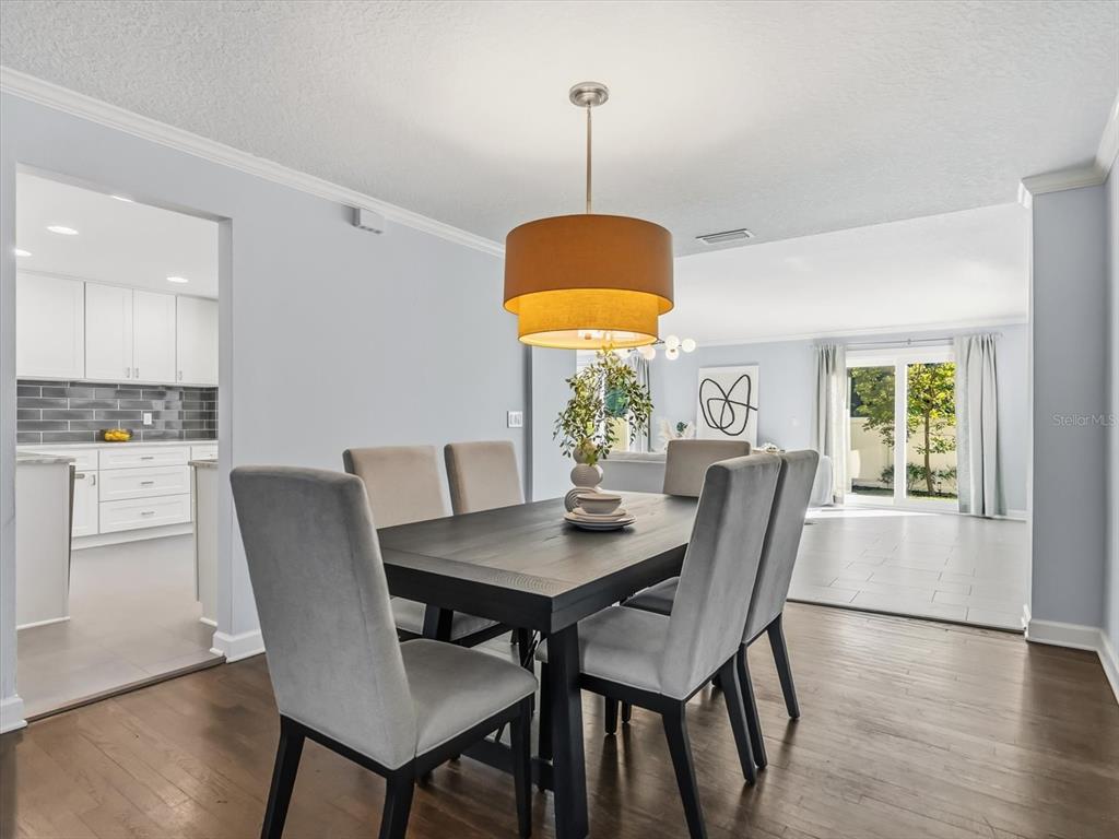 2330 Hickory Lane Orlando, FL 32803 - Photo 6 of 30 a dining room with furniture and window