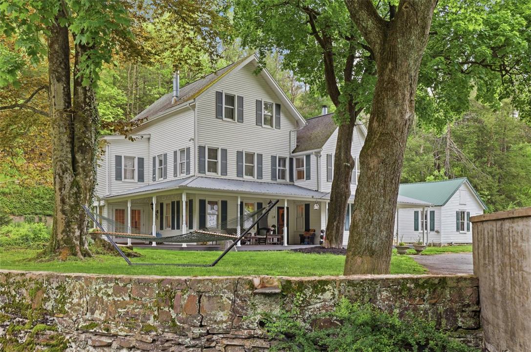 3585 Fairyland Road Lehighton, PA 18235 - Photo 2 of 57 a front view of a house with a yard and trees