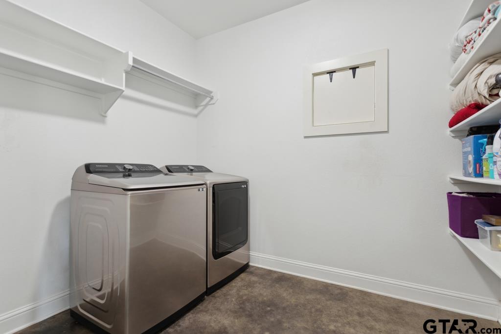15767 County Road 285 Tyler, TX 75707 - Photo 19 of 44 a utility room with dryer and washer