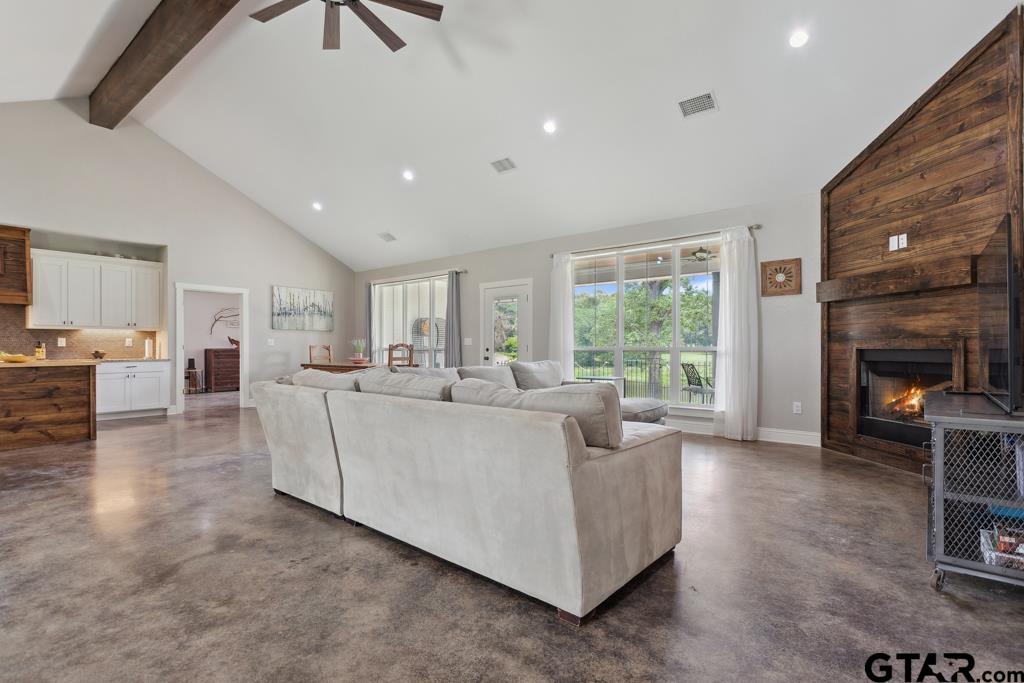 15767 County Road 285 Tyler, TX 75707 - Photo 32 of 44 a living room with furniture and a fireplace