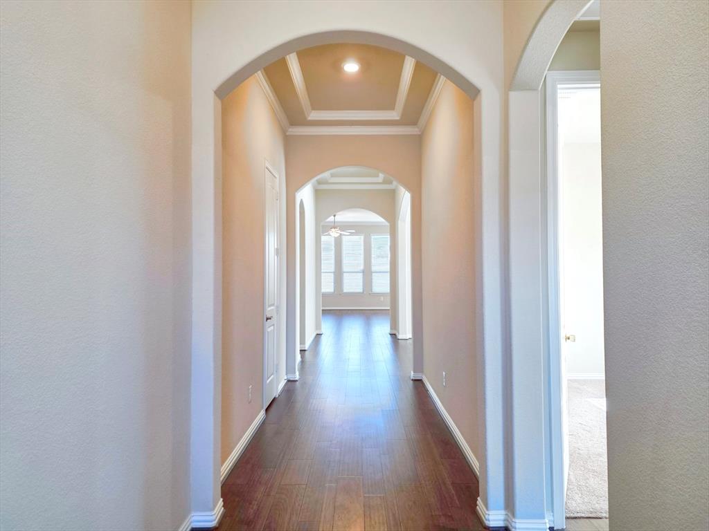 355 Prairie Ridge Lane Lewisville, TX 75056 - Photo 3 of 24 a view of entryway with wooden floor