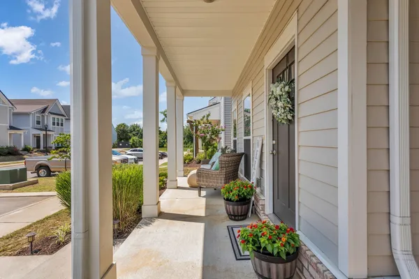 a front view of a house with a porch