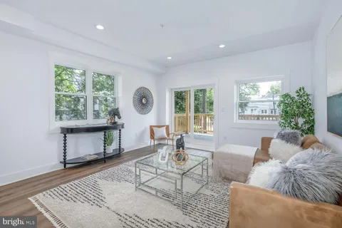 a view of swimming pool with a patio