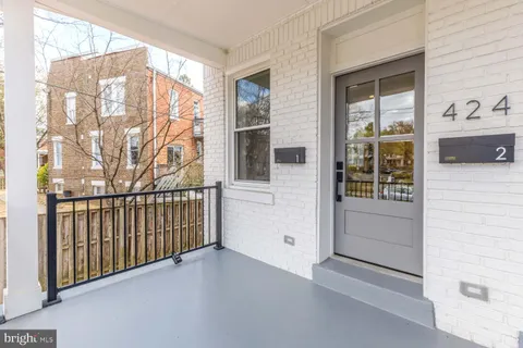 a view of a balcony with an outdoor space