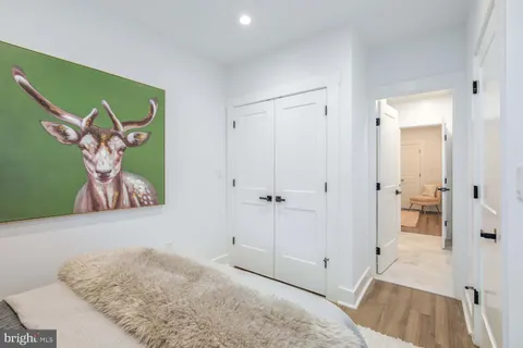a bathroom with a sink a vanity and a mirror