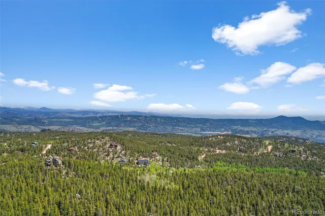 a view of a backyard of a house