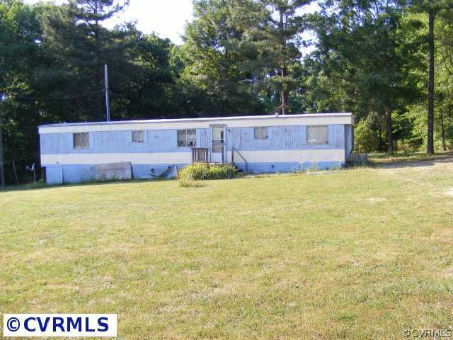 13410 Scotts Road Dewitt, VA 23840 - Photo 1 of 9 a view of a back yard