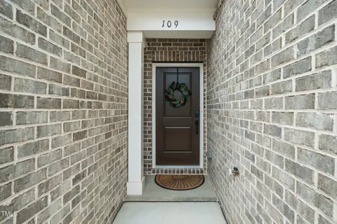 a view of a house with a big yard