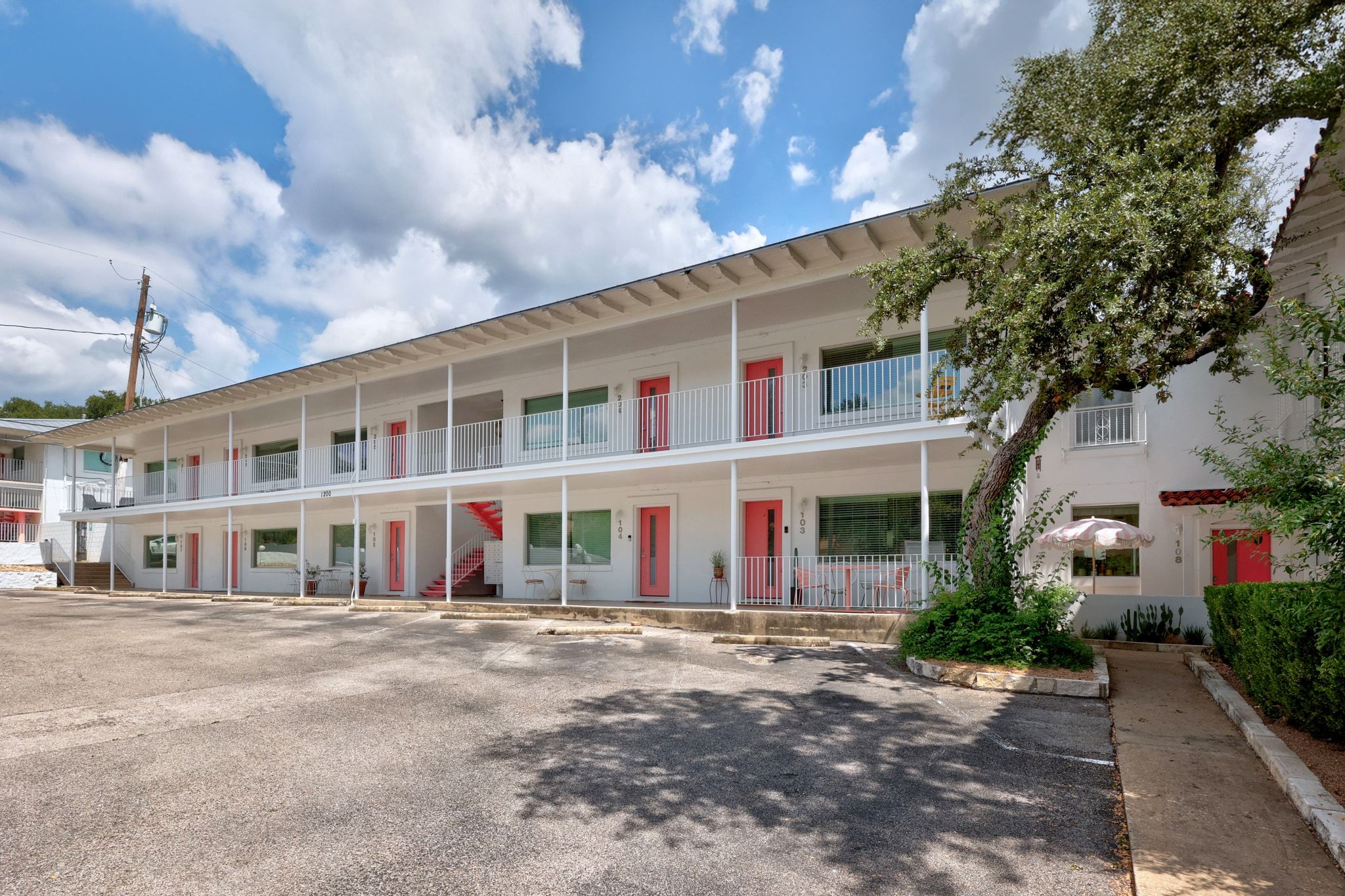 a front view of a building with street view